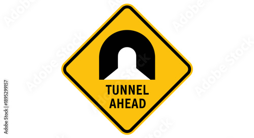 Warning sign indicating tunnel ahead on road infrastructure from driver's viewpoint