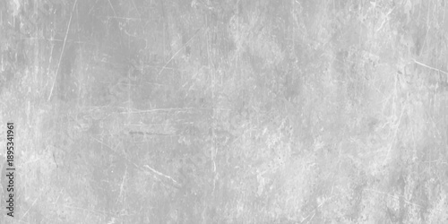 A vintage grey grunge background features a rough textured concrete wall with a dirty cement pattern and weathered metal surface for an old stone material backdrop
