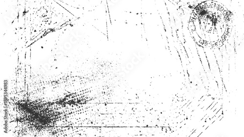 Grungy black ink splatters and smudges on white paper with a faded circular stamp grunge