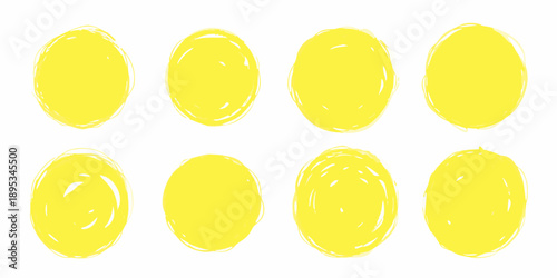 A collection of eight roughly circular textured yellow shapes