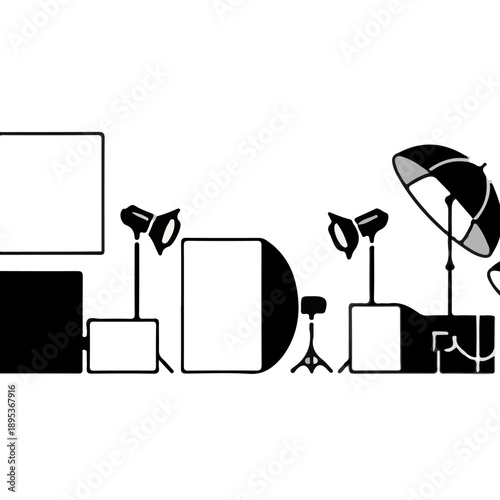 Professional photography studio equipment setup with lights and umbrellas.