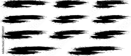 Artistic Brushstrokes: A series of dynamic brushstrokes in shades of black, each stroke expressing energy and motion, create a visually compelling composition that showcases artistic flair.