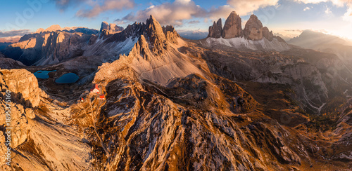 Konstfotografi Scenic view of Tre Cime di Lavaredo peaks with Laghi dei Piani and Rifugio locat