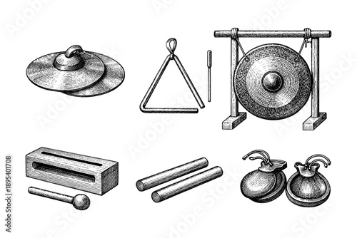 Collection of vintage percussion instruments: cymbals, triangle, gong, claves, castanets