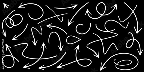 A chaotic arrangement of white arrows and curved lines on black