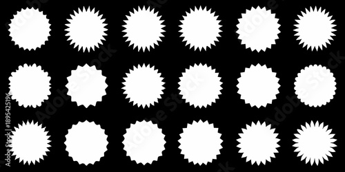 Arrangement of white starburst shaped circles on a black background