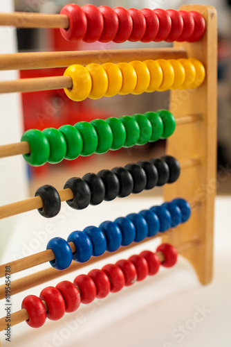 Photos wooden abacus with colorful beads for early learning, educational counting toy f