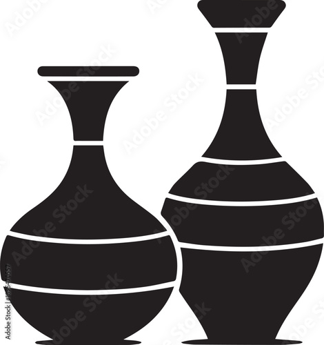 Two antique vases with striped patterns stand together in a minimalist setting from a frontal viewpoint