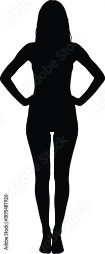 Confident female silhouette standing with hands on hips