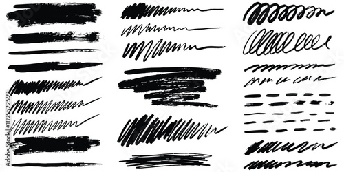 Assortment of black brush strokes and scribbled lines on a white background Keywords: brush stroke, scribble, hand drawn, sketch