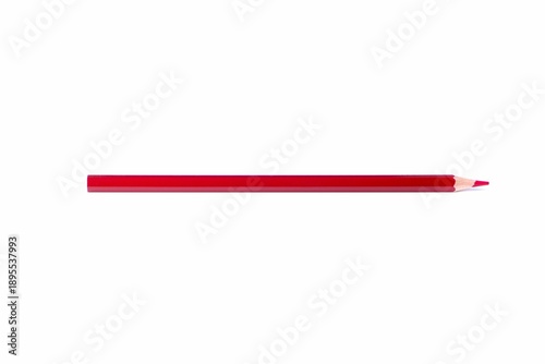 Single red wooden pencil with sharpened tip placed horizontally, isolated on white background. Minimal composition with copy space for creativity, design, and education concepts.