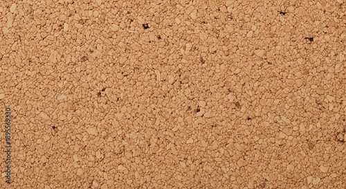 Close-up texture of natural cork material showing distinctive bumpy, granular surface with dark spots and variations. Perfect for backgrounds, design projects, and sustainable material references.