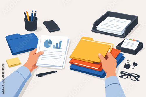 Hands analyzing reports and organizing files on a busy office desk workspace