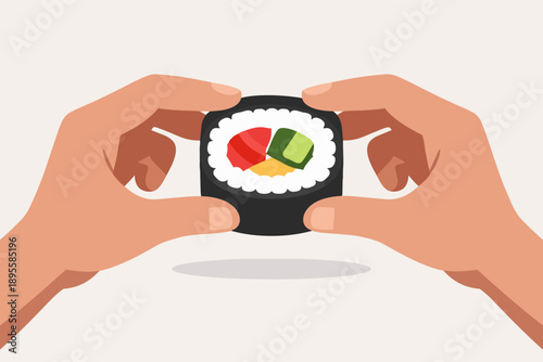 Hands holding a fresh sushi roll, showing japanese maki cuisine and dining experience