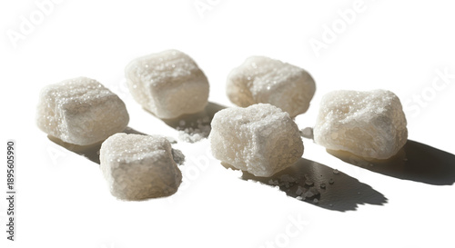 Sugar Cubes Scattered On Wh...