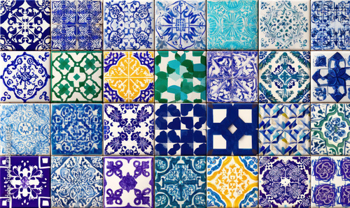 A collection of colorful ceramic tiles with various traditional patterns and designs.