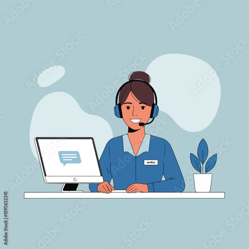 A smiling woman wearing headset, working on a computer at a desk