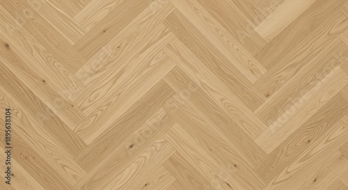 Elegant herringbone pattern of light brown wooden flooring.