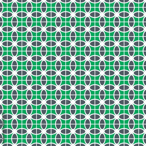 Pattern with gridded ellipses in white and dark green on a green background.