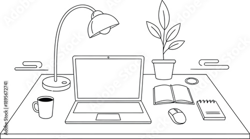 A simple workspace with laptop and office supplies