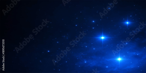 A dark blue abstract galaxy background featuring a starry night sky with glowing light particles and cold nebula dust flowing through the cosmic space of the universe