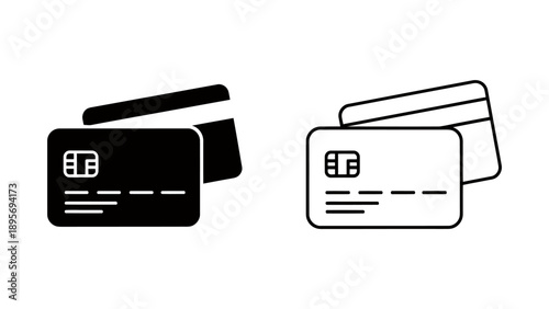 Two overlapping credit cards in contrasting black and white design illustrating payment and finance concepts.