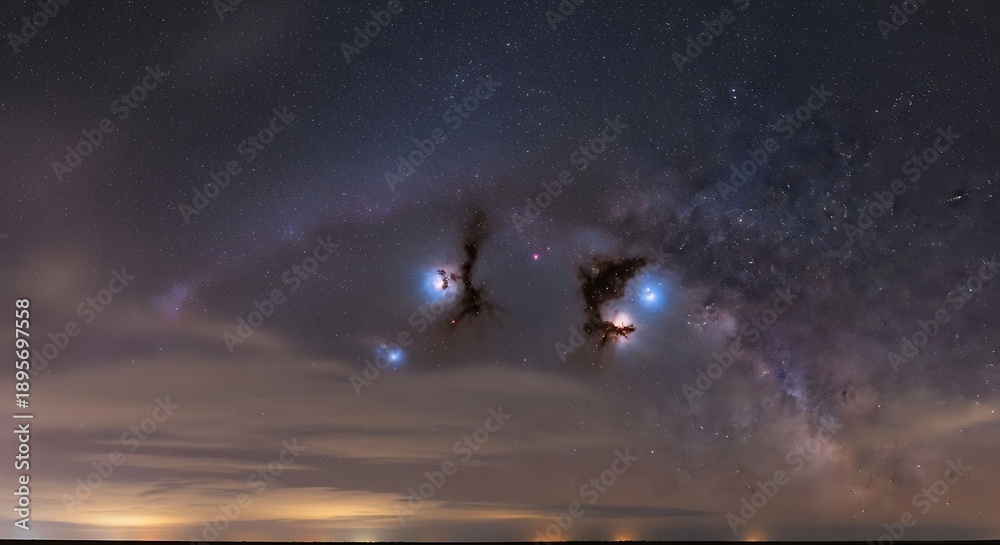 Obraz premium Dramatic Night Sky with Clouds and Stars.