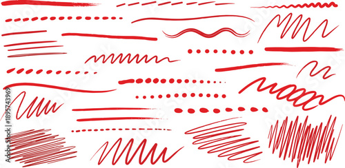 Collection of red scribbles and lines on a plain background from a direct viewpoint
