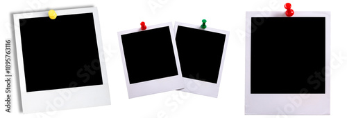collection of blank instant camera photo frames, often known as polaroid, attached with colorful push pins on a dark background.