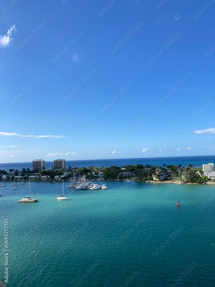 Fototapeta premium Tropical Caribbean Harbor with Sailboats and Turquoise Water