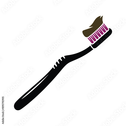 A black toothbrush with pink bristles and a smear of brown paste