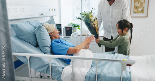 Bild auf Leinwand Grandmother, child and parent with flowers in hospital, get well soon gift and family visit for healing