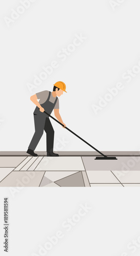 Construction Worker Applying Finish To Newly Laid Floor Tiles With Trowel