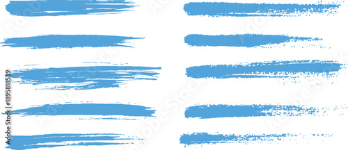 Blue abstract painted ink strokes set on watercolor paper. Brush strokes on a white background. Blue watercolor brush strokes elements set creating abstract paint texture, artistic acrylic grunge.