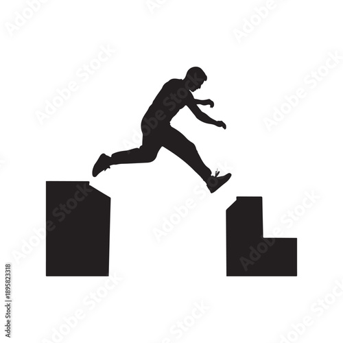 Silhouette of a parkour athlete leaping across a wide gap between two tall urban buildings