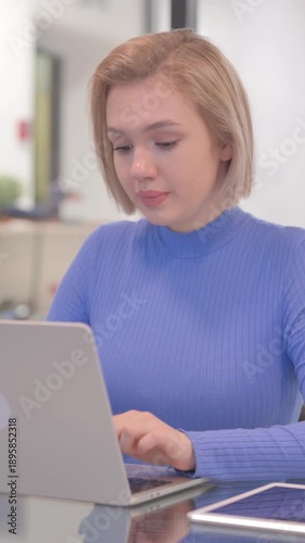 Rejecting Young Woman Denying while Working on Laptop in Office, vertical video