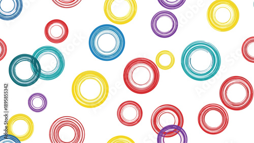 Seamless pattern featuring vibrant hand-drawn circles in red yellow blue and purple on a crisp white background for textile design.