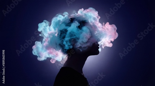 Person's head silhouette with colorful smoke clouds symbolizing thoughts or ideas in the mind