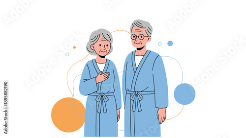 Elderly couple in comfortable blue bathrobes smiling together while enjoying a relaxing morning at home or a spa retreat.
