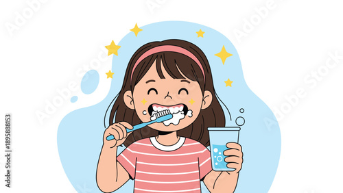 Smiling young girl with a pink headband brushing her teeth and holding a cup of water in front of a blue background.