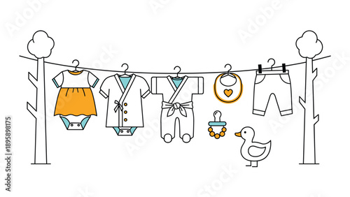 Baby clothes and accessories like onesies, a dress, bib, and pacifier hanging on a clothesline between two green trees.