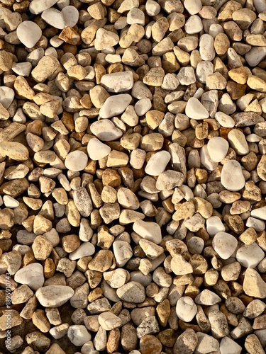 Warm pebbles stones lit by the sun