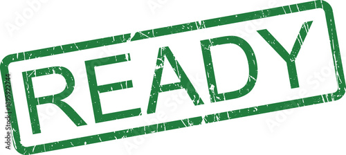 A green distressed rubber stamp prominently displays the word READY on a clean white surface