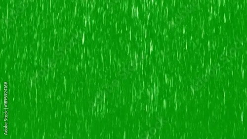 Heavy rain effect on green screen background with falling raindrops for nature weather and environmental concepts