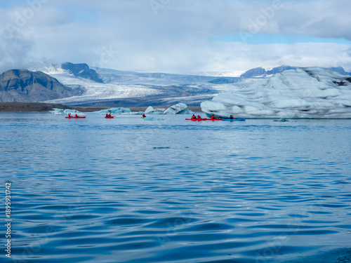 Group of kayakers in Iceland's Jokulsarlon Glacier Lagoon