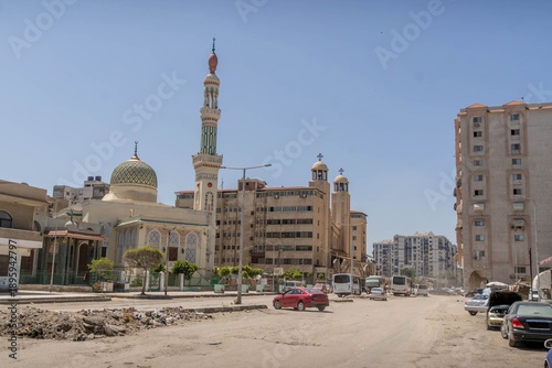 Vászonkép Mosque and Arabic minaret along wide empty street in Port Said, Egypt urban district