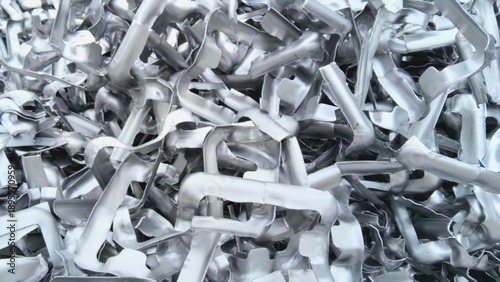 Industrial scrap metal pieces for recycling process, sustainable resource management and eco-friendly manufacturing concept. 