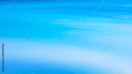 Azure light blue  summer sea water surface effect abstract gradient aquatic aerial luxury decorative background texture 