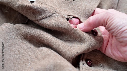 sweater with moth holes
