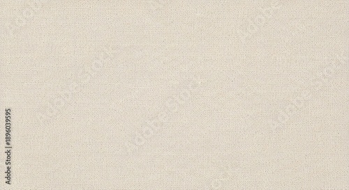 A blurry image of a beige textured surface with illegible writing